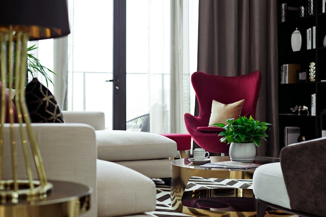 Luxurious vintage living room with velvet furniture and gold accents